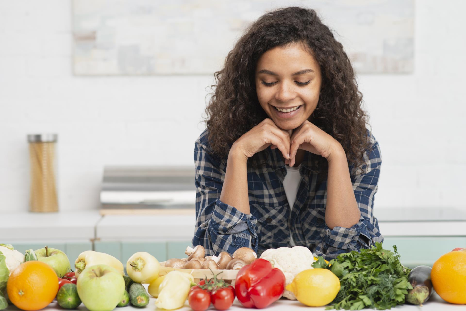 portrait-smiling-woman-looking-vegetables