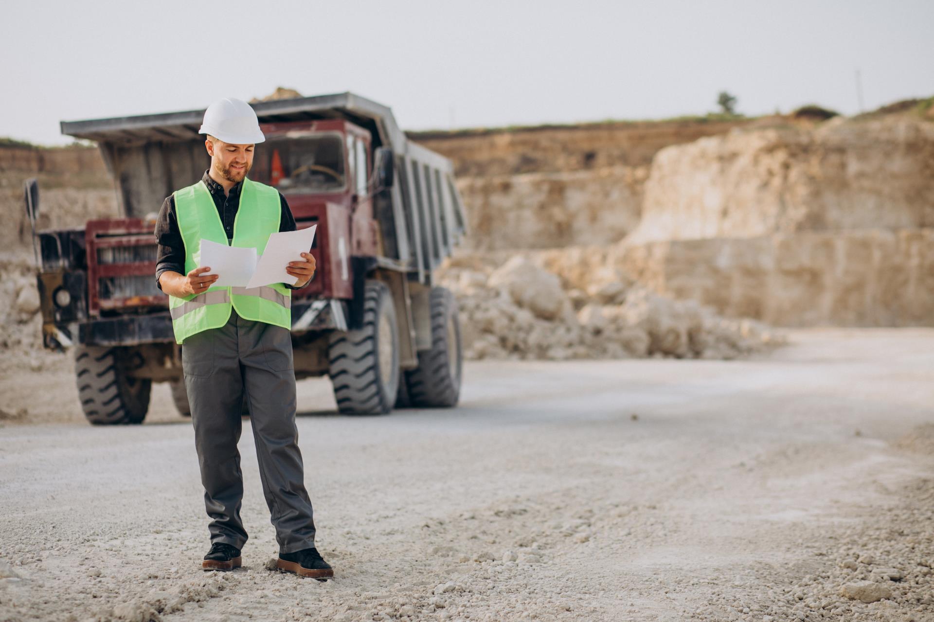 male-worker-with-bulldozer-sand-quarry