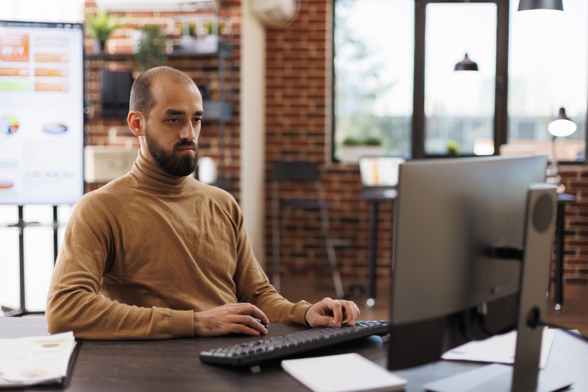 startup-project-manager-analyzing-financial-data-startup-management-plan-while-office-workspace-development-department-team-leader-researching-investment-ideas-business-solutions