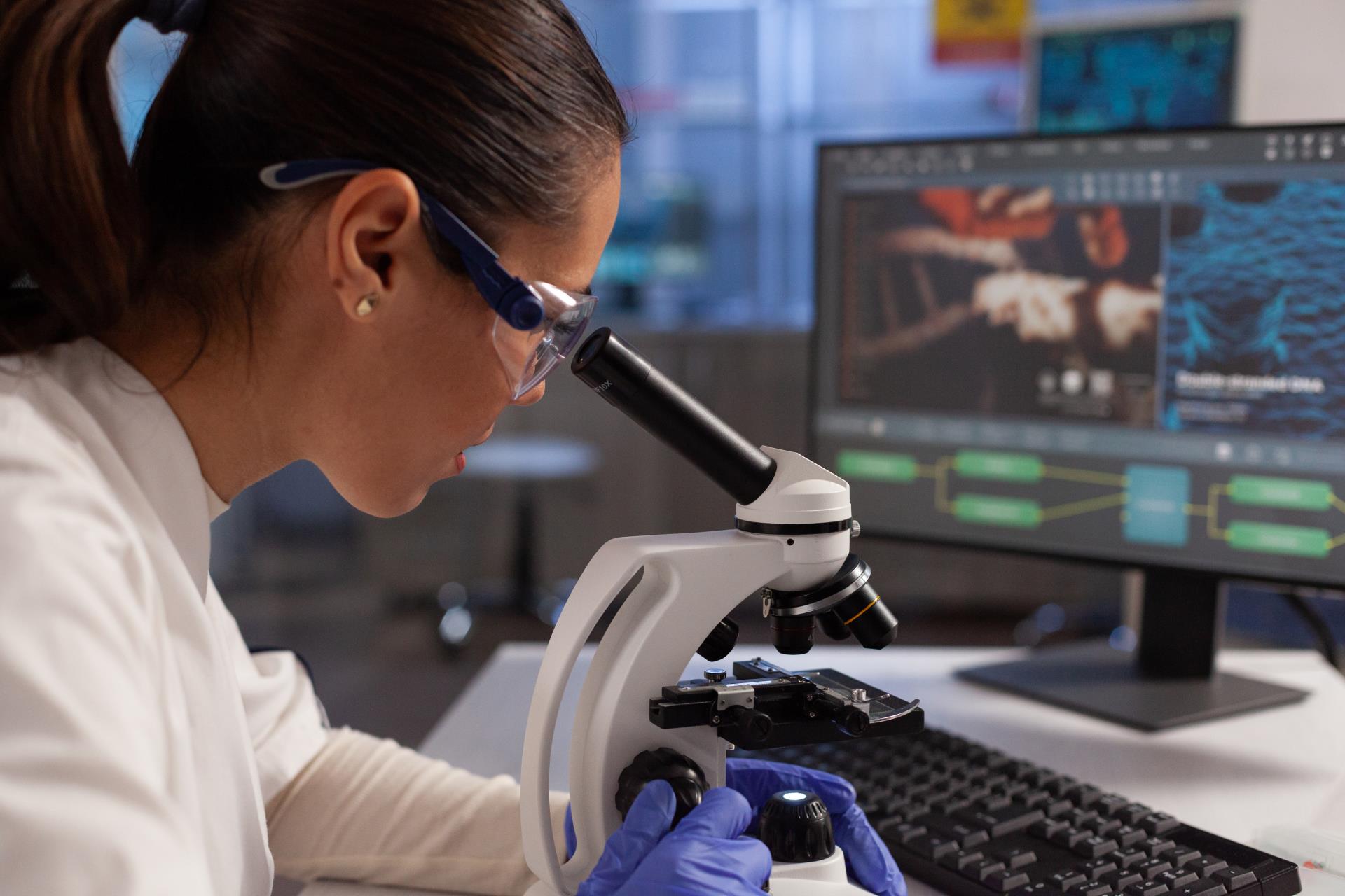 biochemist-working-microscope-cell-illustration-computer-screen-chemical-laboratory-scientist-woman-analyzing-virus-dna-cell-tissue-diagram-plasma-hemoglobin-nucleus
