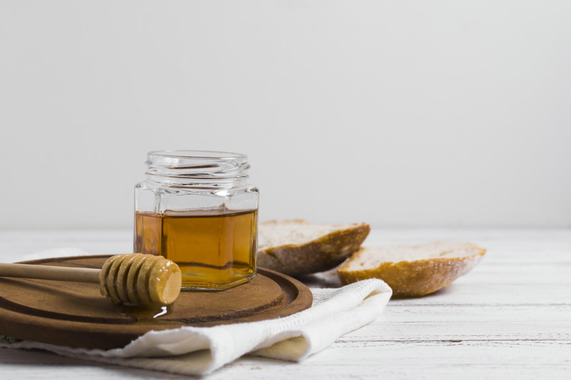 bread-with-honey-wooden-board