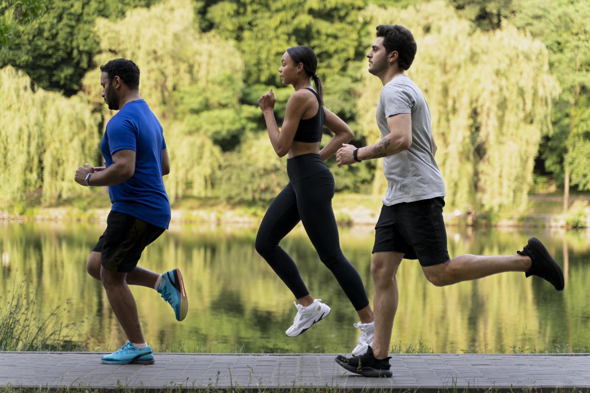 full-shot-people-running-together-outdoors