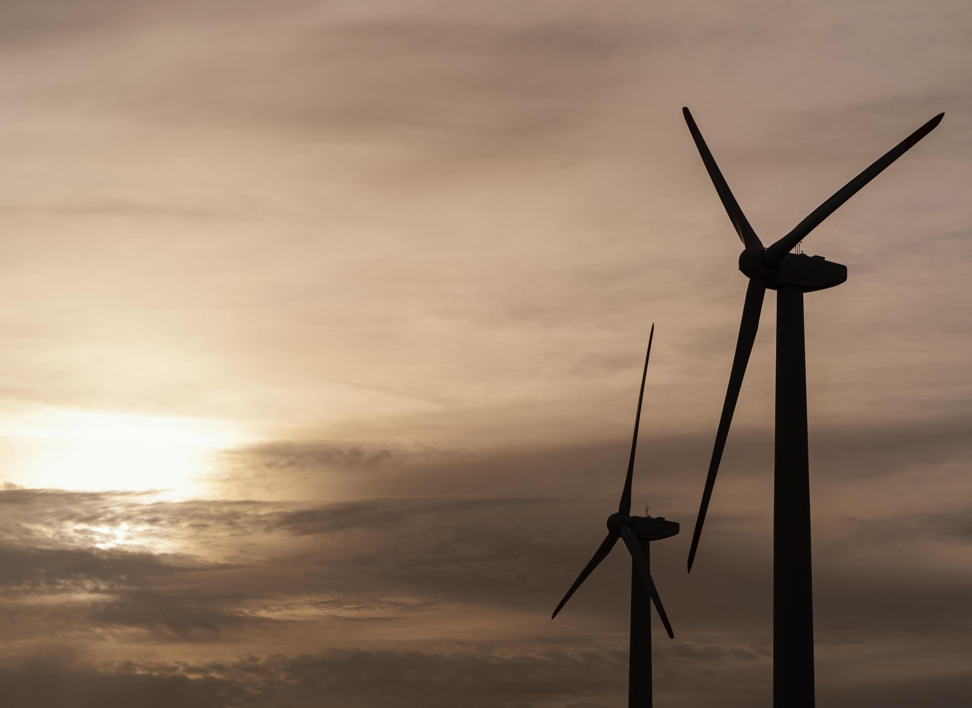 side-view-wind-turbine-silhouette-generating-electricity