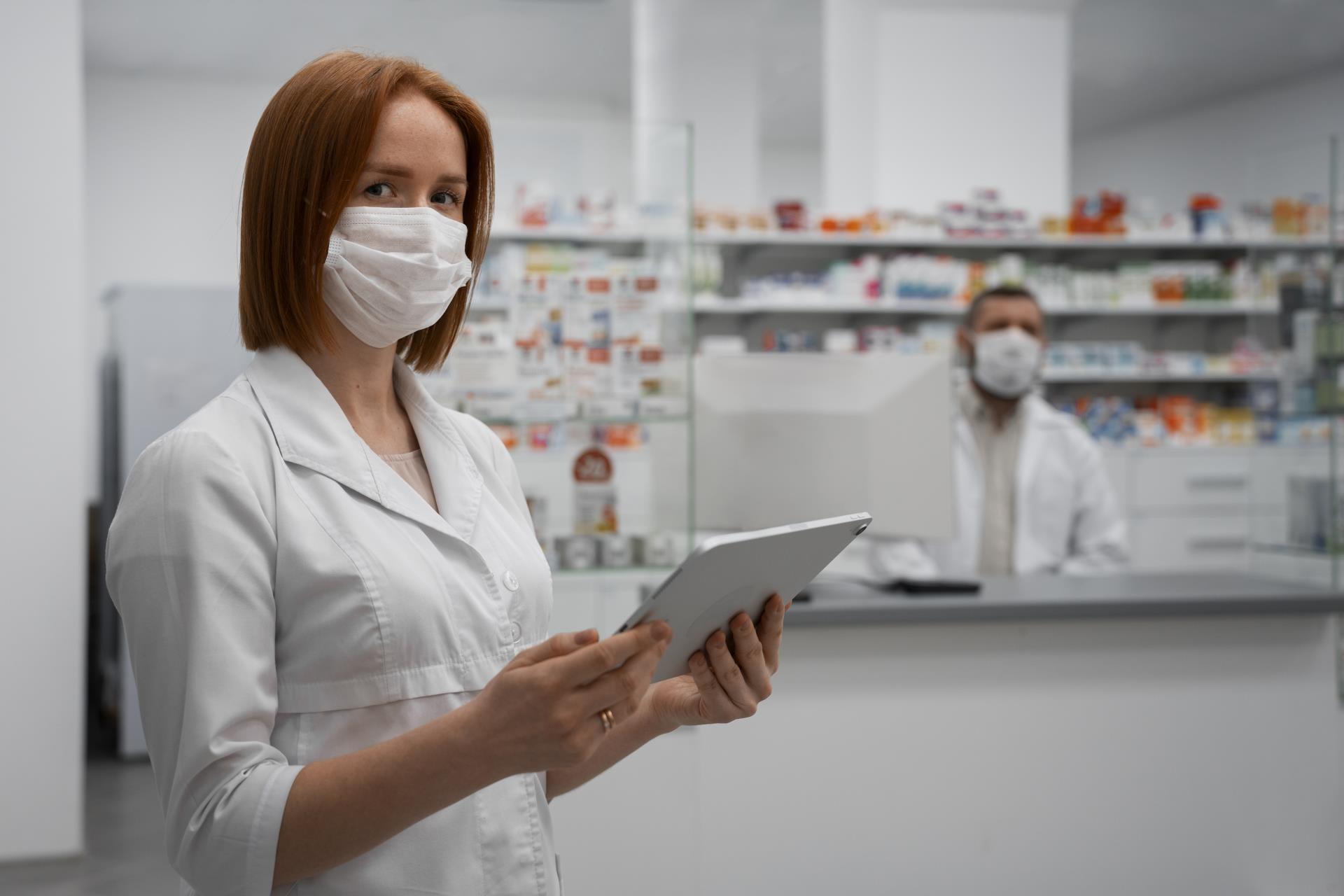 female-pharmacist-working-with-tablet-pharmacy