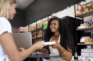 close-up-woman-buying-product