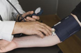 doctor-checking-blood-pressure (1)