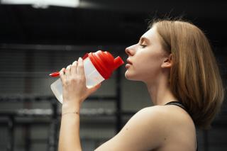 side-view-woman-drinking-water