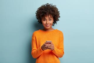 young-woman-with-afro-haircut-wearing-sweater