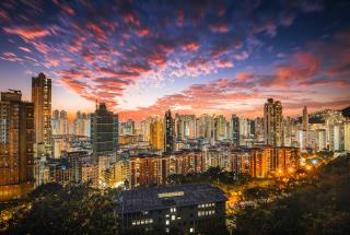 beautiful-modern-city-with-skyscrapers-pink-clouds-sky