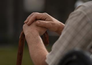 side-view-old-man-sitting-bench