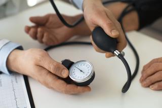 older-person-checking-their-blood-pressure-with-tensiometer