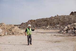 worker-hardhat-standing-sand-quarry