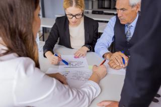 group-business-people-discussing-business-plan-table-office