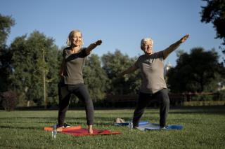 mature-couple-practicing-yoga-outside