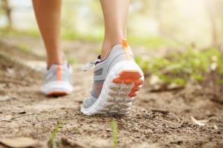 rear-cropped-shot-athletic-legs-woman-jogger-wearing-pink-running-shoes-jogging-exercise-outdoors